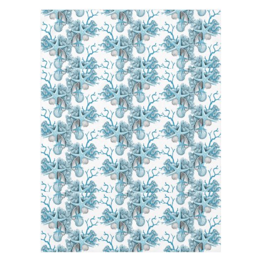 熱帯ヒトデは珊瑚の青く白い銀を殻から取り出します テーブルクロス (正面)