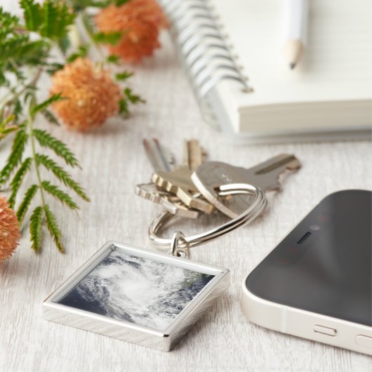 熱帯低気圧ファミリーがマダガスカル上空を飛行する キーホルダー (側面)