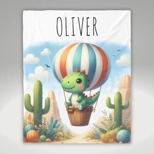 熱気球飛んでいるに乗ったかわいい恐竜 フリースブランケット