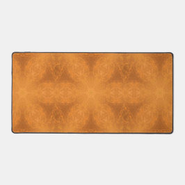 燃えたオレンジ色の星の万華鏡のように千変万化するパターン デスクマット