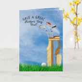 父の日のゴルフボールと草の中のバッグ カード (黄色い花)