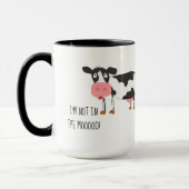 牛おもしろいは泥の中にない マグカップ (左)