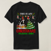 牛おもしろい牛クリスマスライトかわいいクリスマスサンタ Tシャツ (デザイン正面)