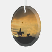 牛がカウボーイを運転し、日の入りを操縦 ガラスオーナメント (正面左)