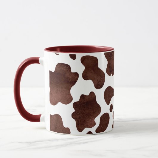 牛の斑点のパターン茶色と白アニマルプリント マグカップ (左)