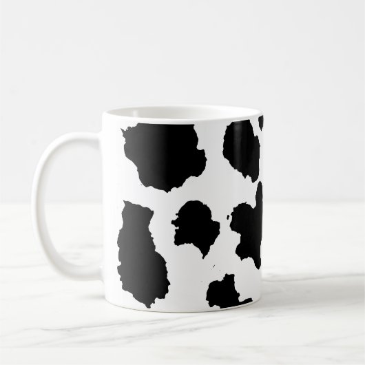 牛の皮の白黒パターン コーヒーマグカップ (左)