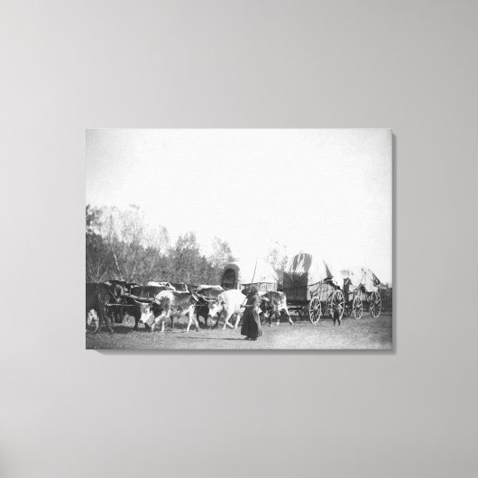 牛の電車でブルホーカーを持つ女と男の子 キャンバスプリント (正面)