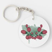 牡丹が芽を出す。水の色花の構成。 キーホルダー (正面)