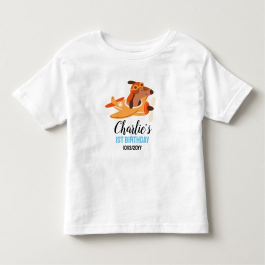 犬のパイロットが飛行機を飛ばす、かわいい子供たちの青い誕生日 トドラーTシャツ (正面)