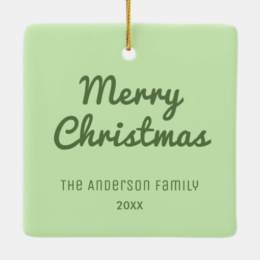 犬の初めてのクリスマスペットの子犬の写真の足跡 セラミックオーナメント (裏面)