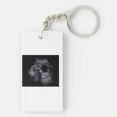 犬の祖父母から人間に昇進する キーホルダー (裏面)