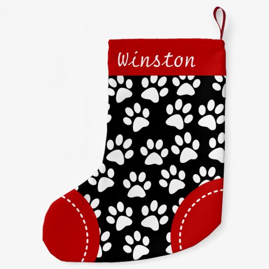 犬の足をテーマにした黒いクリスマスパーソナライズされた スモールクリスマスストッキング (裏面)