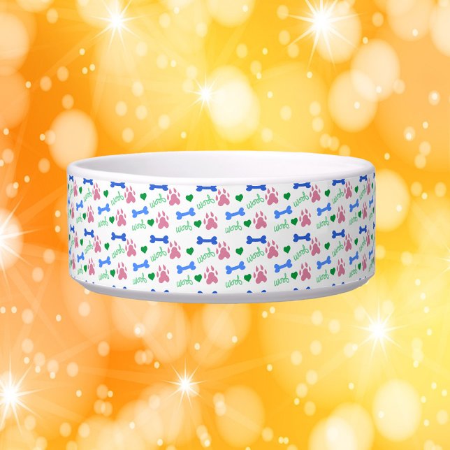 犬の足跡・骨・ハート Woof柄 ピンク・ブルー・グリーン ボウル (A dog bowl with a pattern of dog paws, bones, hearts and woof in pink, green and blue.)