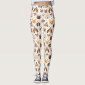 犬の顔インウィンターハッツホリデーパターン レギンス (正面)
