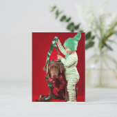 犬を飾っている小さい男の子 シーズンポストカード (スタンド正面)