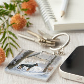 (犬)ドーベルマン・ピンシェルは雪のクリスマスを許す キーホルダー (正面右)