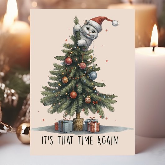 猫がクリスマスツリーに登る面白いデザイン シーズンカード