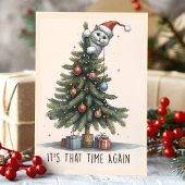 猫がクリスマスツリーに登る面白いデザイン シーズンカード