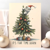 猫がクリスマスツリーに登る面白いデザイン シーズンカード