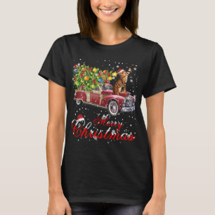 猫がレッドトラッククリスマスパジャマに乗る Tシャツ