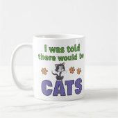 猫が出ると聞いていたのに コーヒーマグカップ (左)