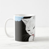 猫が前足をきれいにする コーヒーマグカップ (左)