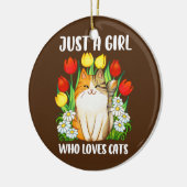 猫が好きな女の子が水色の猫の子宮 セラミックオーナメント (左)