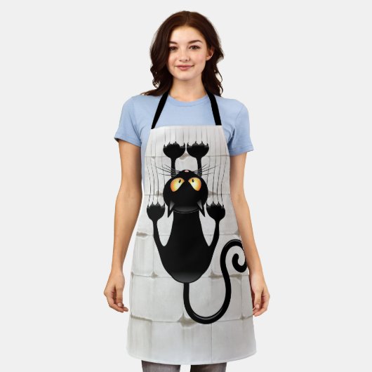 猫が落ちるおもしろい エプロン (着用した状態)