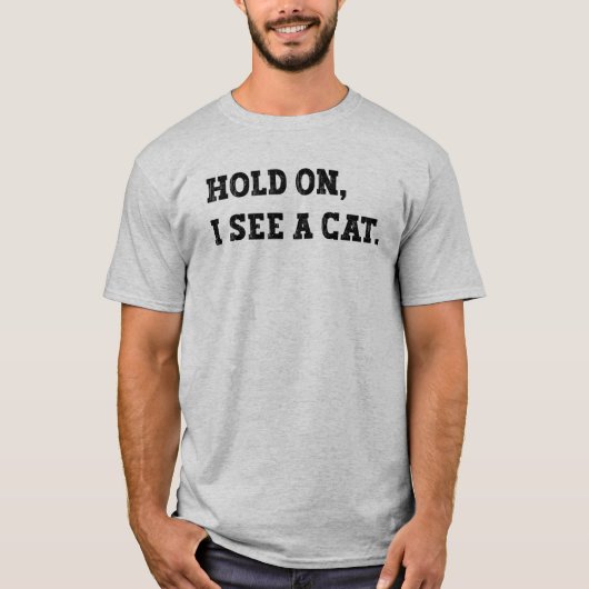 猫が見える猫おもしろいミーム Tシャツ (正面)