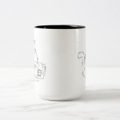 猫が言うには、コーヒーを飲むと感じ殺される量が減る ツートーンマグカップ (中央)