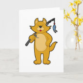 猫が釣り竿と魚で釣りをしている カード (黄色い花)