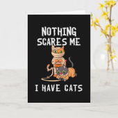 猫が面白いハロウィーン猫を飼っていて何も怖くない カード (黄色い花)