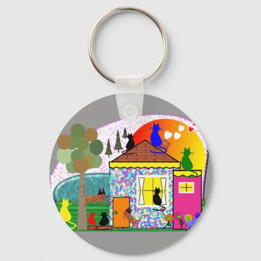 猫たちが家を引き継いでいる キーホルダー (正面)