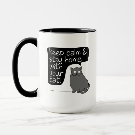 猫と保暮らしていらっしゃる マグカップ (左)