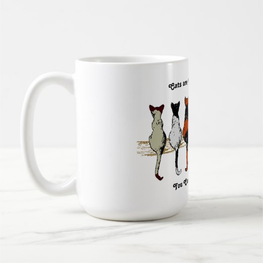 猫と猫と子猫のマグカップ コーヒーマグカップ (左)