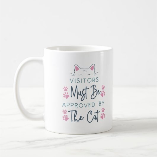 猫に会う客は猫の許可が必要 コーヒーマグカップ (左)