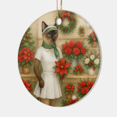 猫の女性ゴルファーをテーマにしたゴルフクリスマステーマ セラミックオーナメント (左)