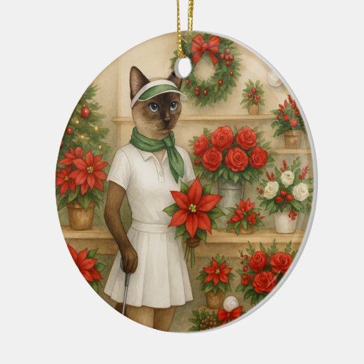 猫の女性ゴルファーをテーマにしたゴルフクリスマステーマ セラミックオーナメント (左)