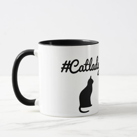 猫の女性 マグカップ (左)