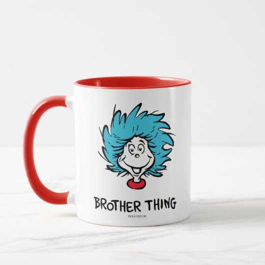 猫の帽子の中の一つ二つ兄弟物 マグカップ (左)