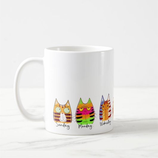 猫の日 曜日がわかる面白い猫 コーヒーマグカップ (左)