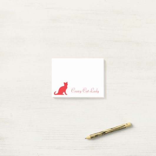 猫の熱狂するレディーポスト®ノートと赤いキットンのロゴ ポストイット (デスク上)