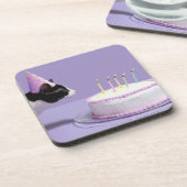 猫の蝋燭を吹く身に着けている誕生日の帽子 コースター (左側)