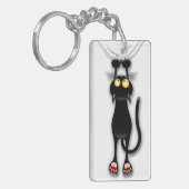 猫の面白いキャラクターが布を引っかく キーホルダー (正面左)