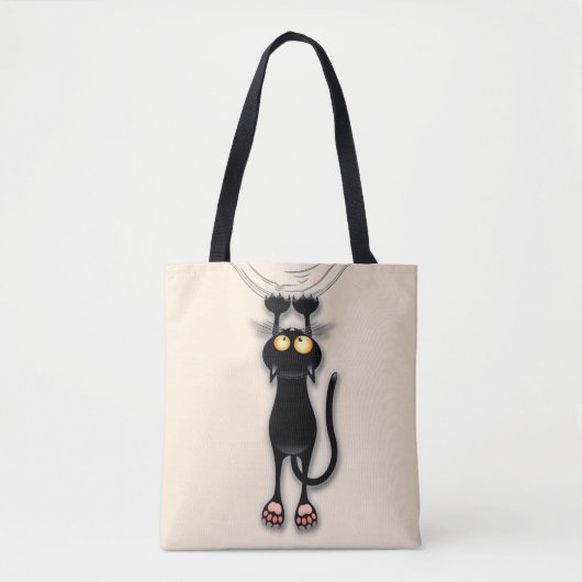 猫の面白いキャラクターが布を引っかく トートバッグ (正面)