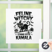 猫の魔女がカマラハロウィーンに投票 ウィンドウサイン (ホーム)