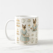 猫はロンドン・イングランドでアフタヌーンティーを飲んでいる コーヒーマグカップ (左)