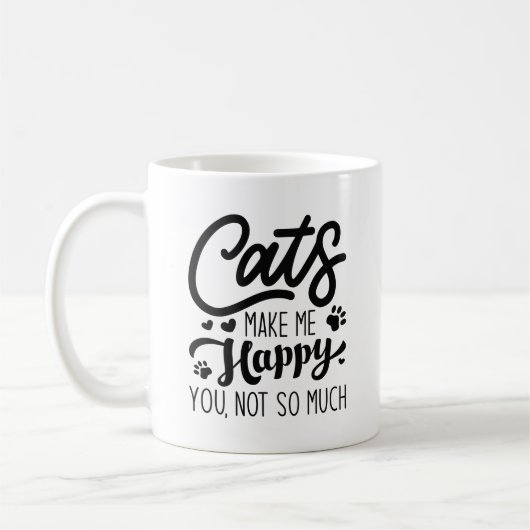 猫は幸せにそんなに嬉しくない コーヒーマグカップ (左)