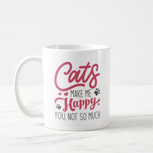 猫は幸せにそんなに嬉しくない コーヒーマグカップ (左)