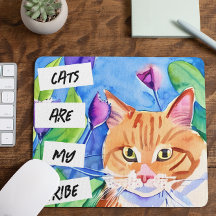 猫は私の部族 |オレンジ色の猫と花